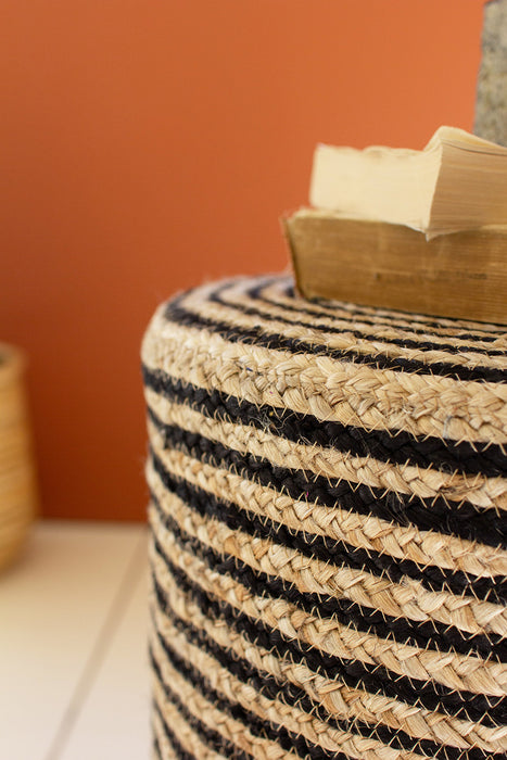 Stylish and Eco-Friendly Seating with Black and Natural Round Jute Pouf
